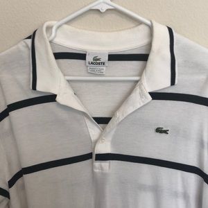 Lacoste polo. White with blue stripes.